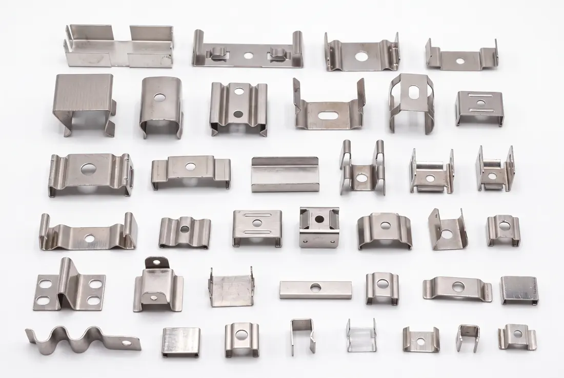 Selection of small stamped sheet metal clips and formed components